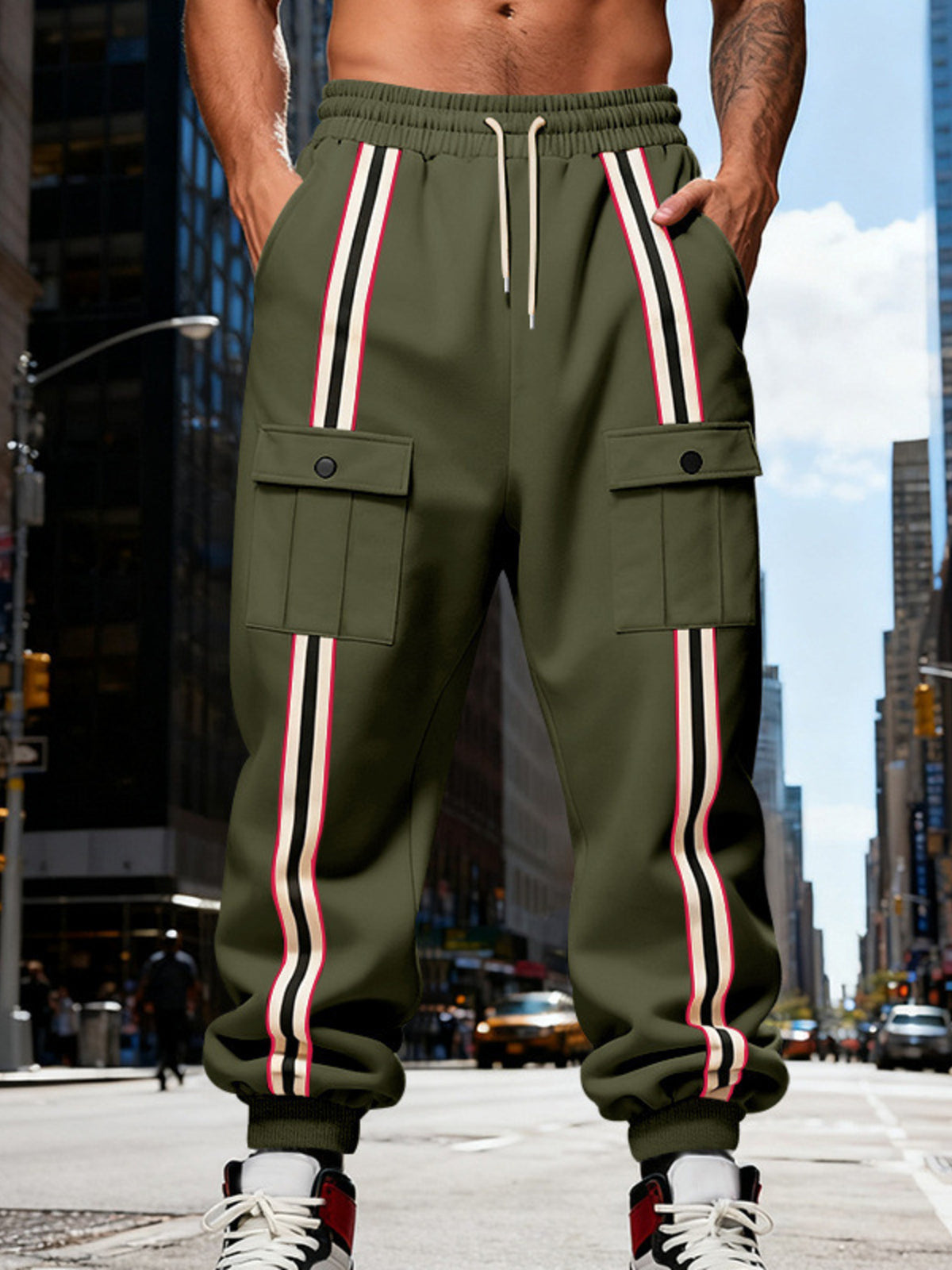 Gray striped joggers displayed against a white background