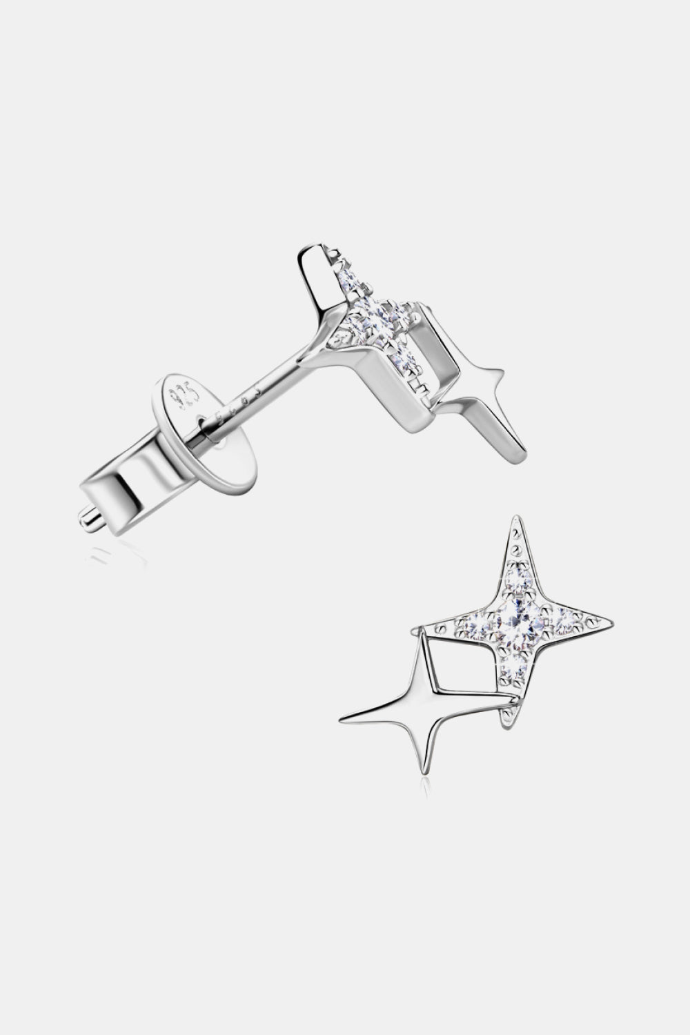 Silver-tone star-shaped stud earrings showing their posts and butterfly backs