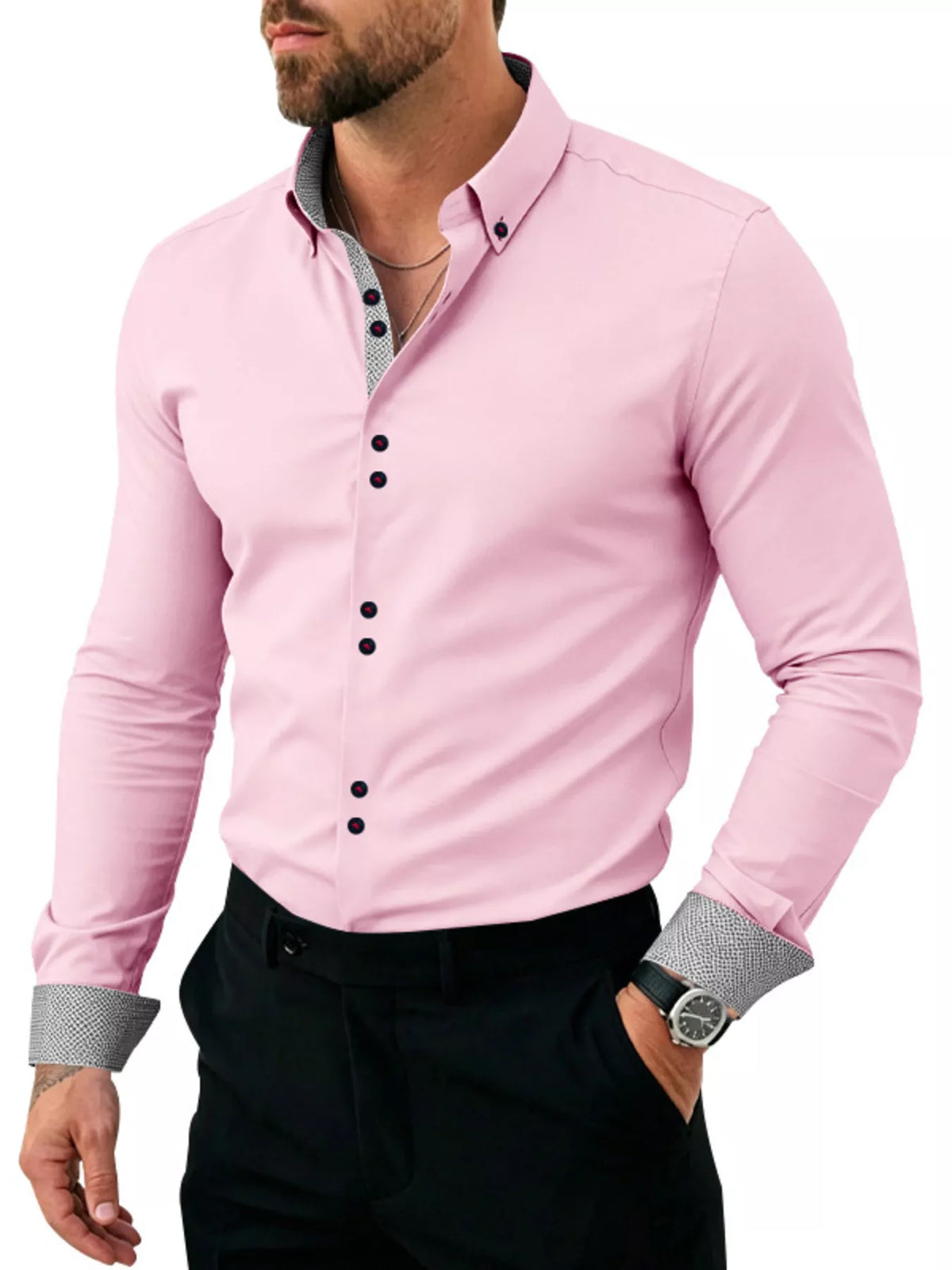 Model wearing navy shirt showing button placket and patterned cuffs