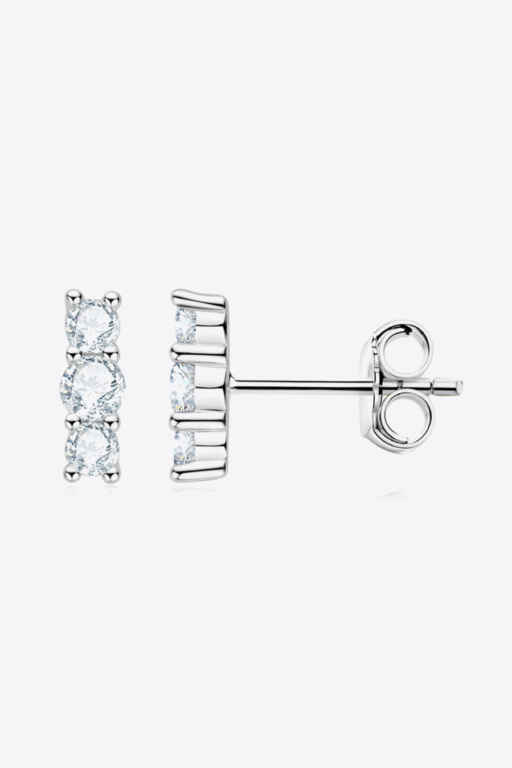 Silver-tone three-stone vertical stud earring, side view
