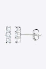 Silver-tone three-stone vertical stud earring, side view