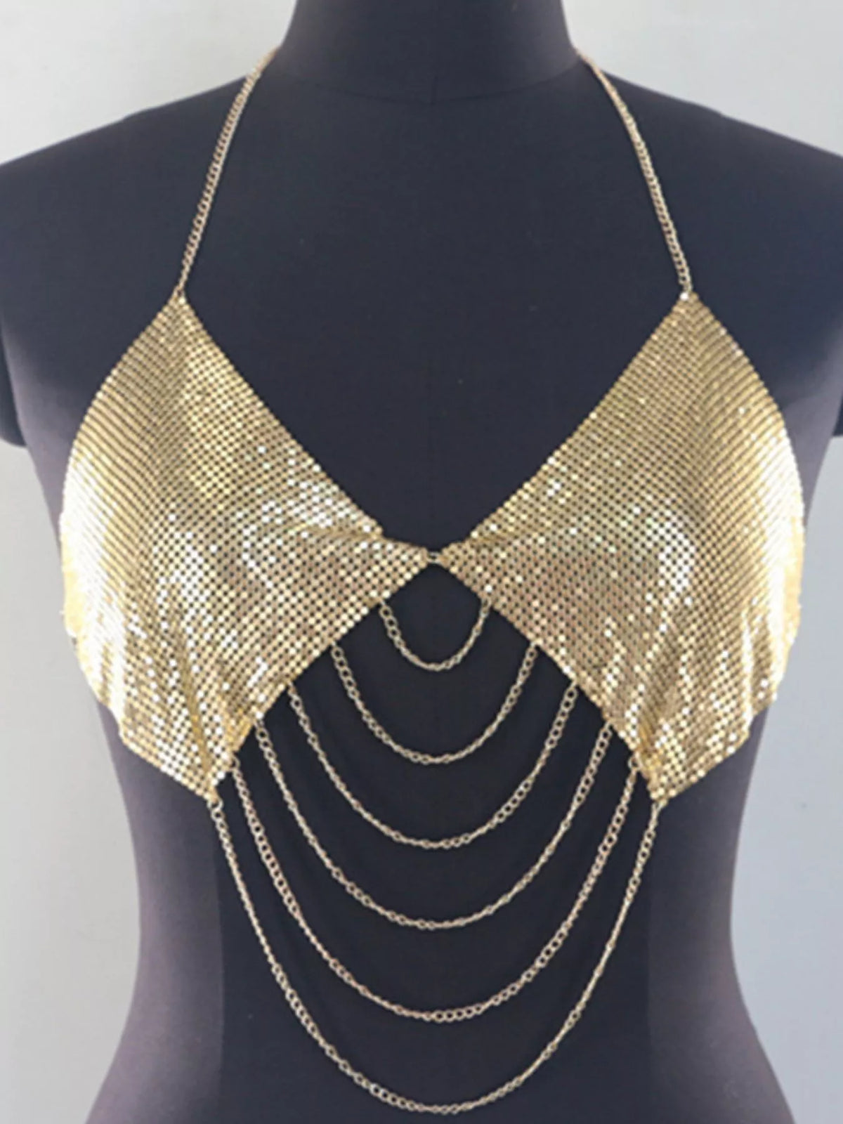 Gold chainmail halter top shown from the side