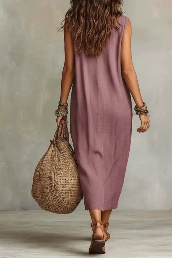 Back view of mauve sleeveless midi dress with straight back neckline