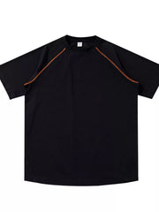 Flat lay of black T-shirt with contrast shoulder piping
