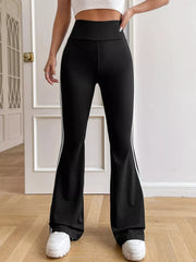 Black high-waisted flare pants with white stripes, front view