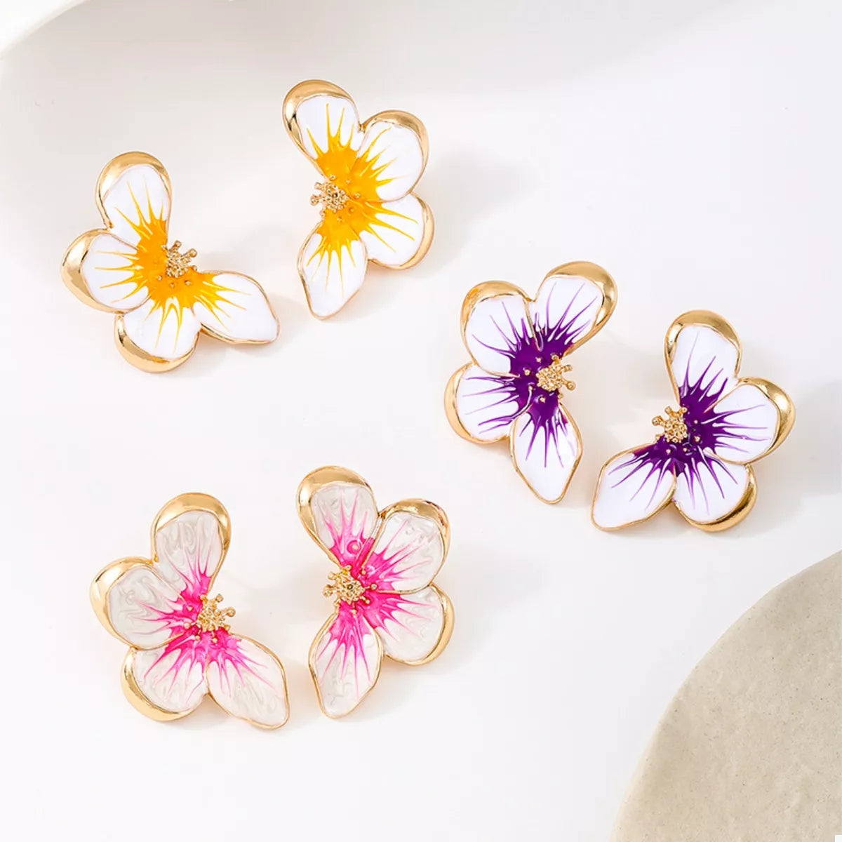 Flower stud earrings in yellow, pink and purple colour options