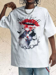 Model wearing white graphic short-sleeve T-shirt with illustrated mouth and chain design