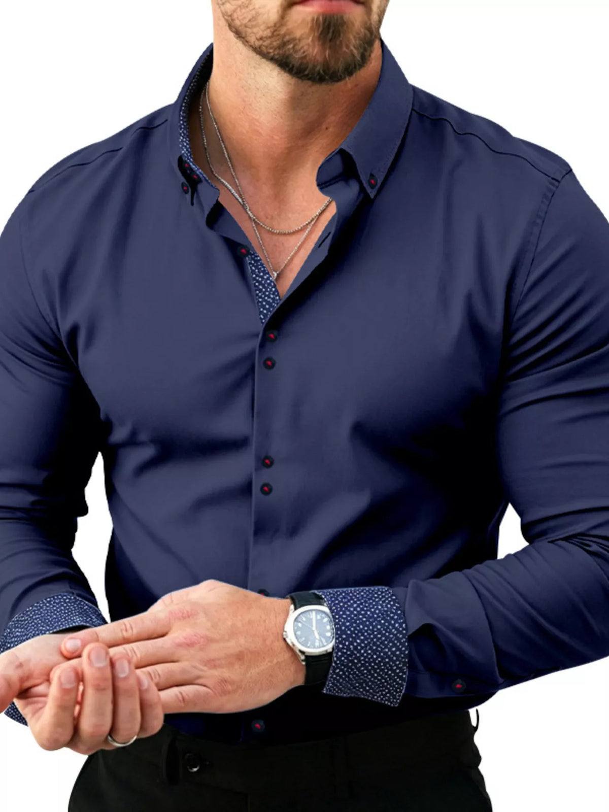 Model wearing navy shirt with contrast inner placket and patterned cuffs
