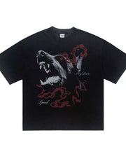 Black T-shirt with wolf and red serpent graphic, laid flat