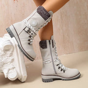 White ankle boots shown from the side