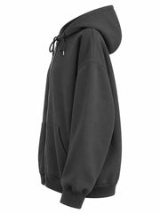 Side view of the charcoal hoodie showing its hood profile and roomy sleeve