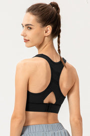 Back view of black racerback sports bra with keyhole opening and hook closure