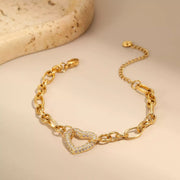 Gold-tone rhinestone chain bracelet arranged in a loop
