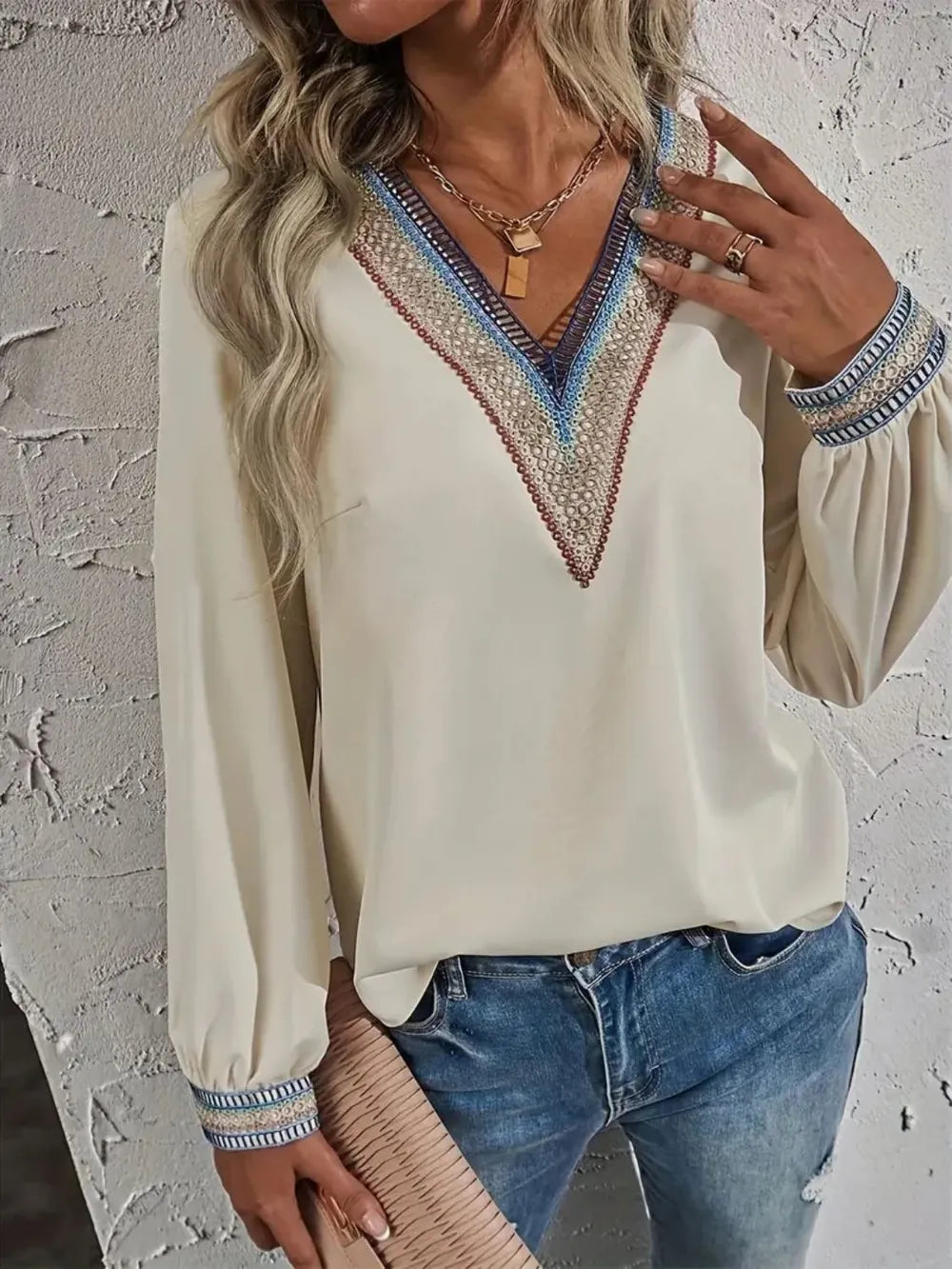 Contrast V-neck long-sleeve blouse in cream neckline detail