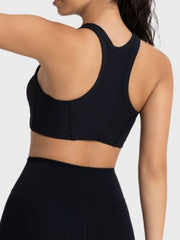 Black cropped sport tank showing racerback design