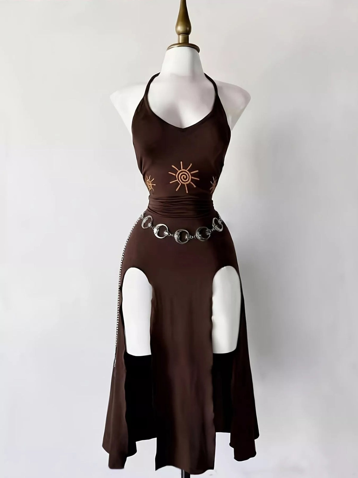 Dark-brown halter dress with sun motif and waist cut-outs, front view on mannequin