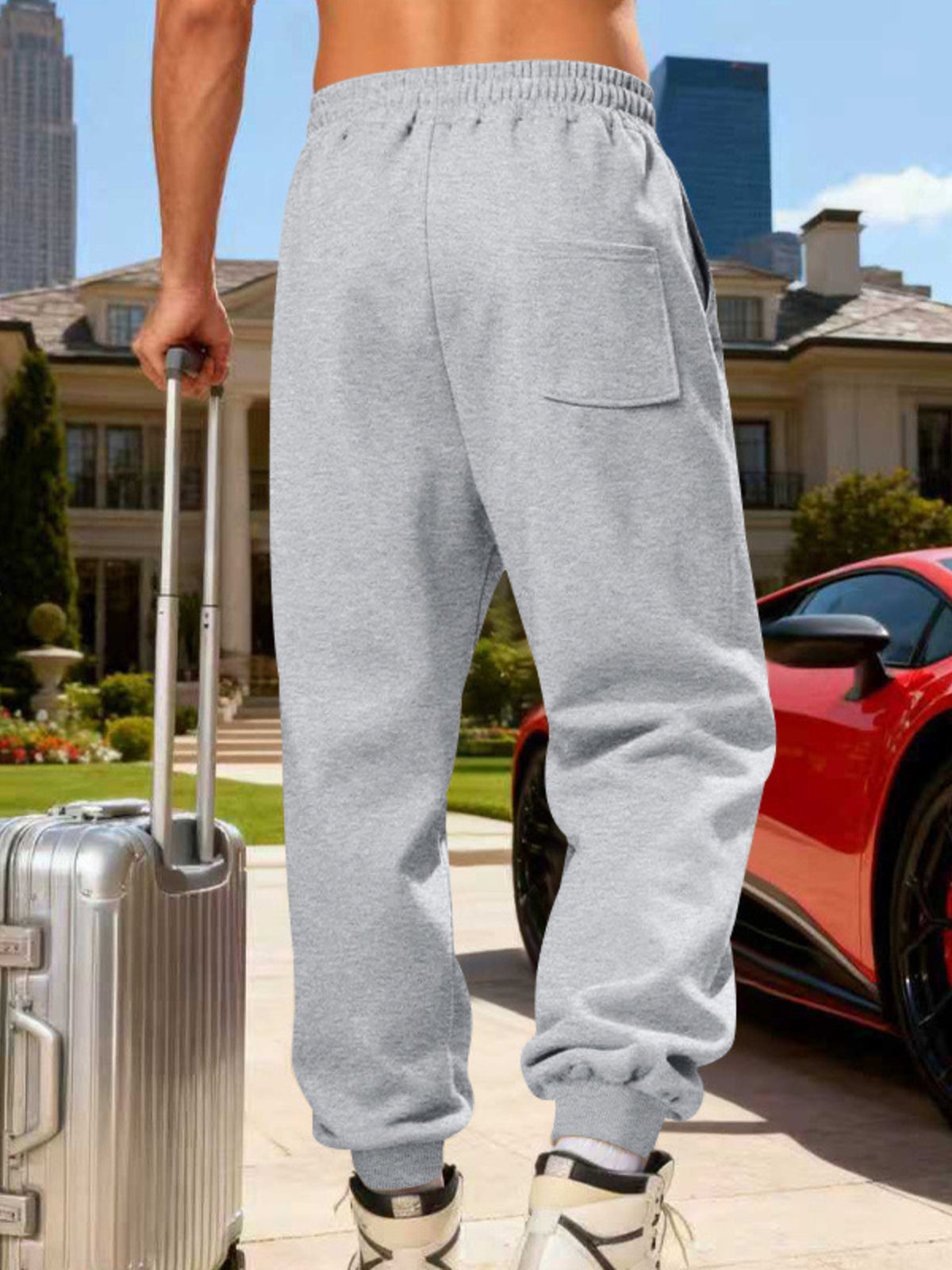 Side view of gray cargo joggers with large pocket