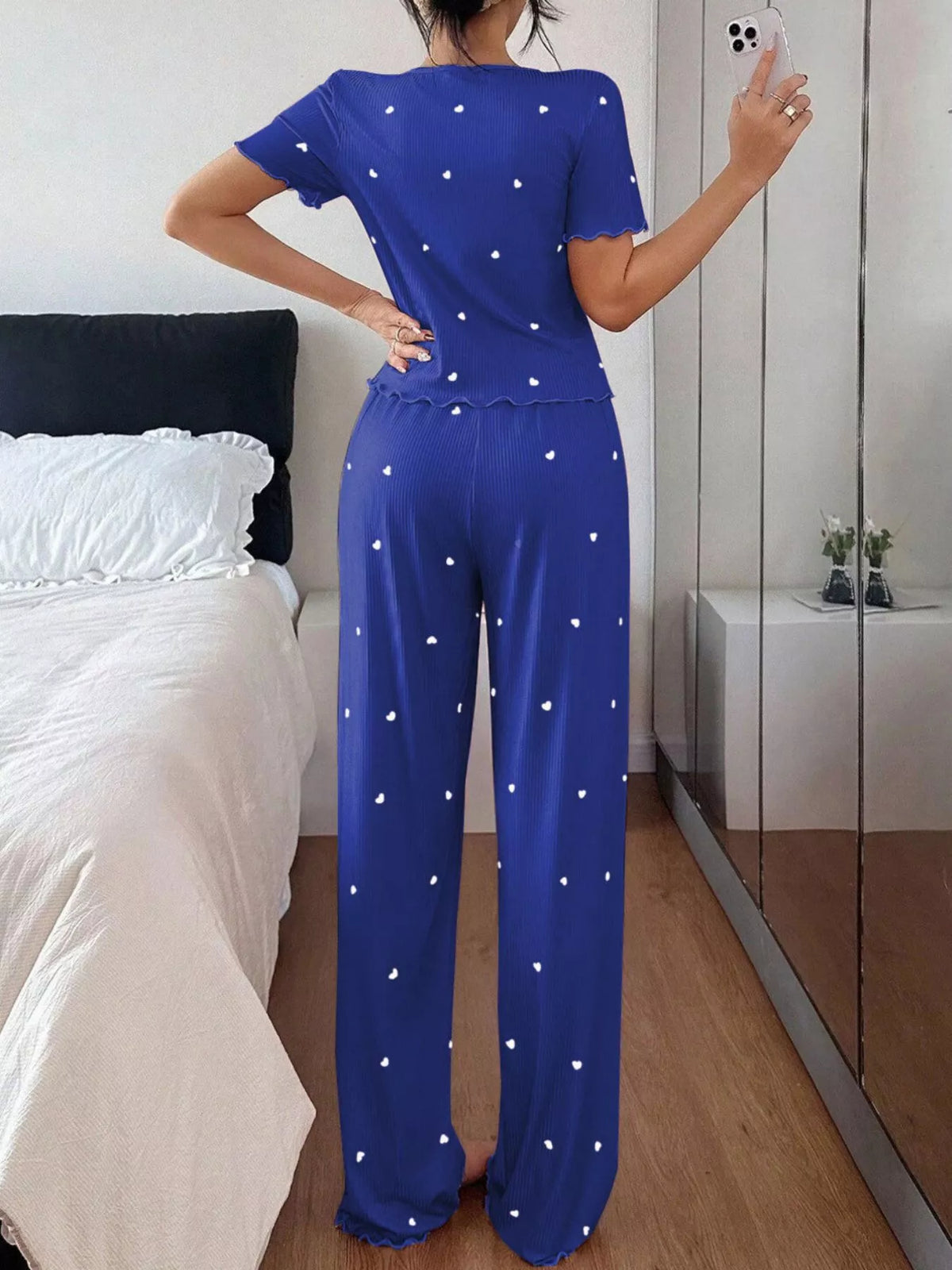 Back view of blue heart-print top and matching pants