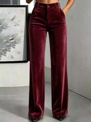Burgundy high-waisted velvet wide-leg pants with front pockets, front view
