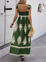 Back view of dark green floral maxi dress