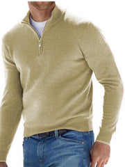 Olive quarter-zip sweater modeled with blue jeans