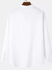 Back view of a plain white long-sleeve shirt on a hanger