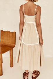 Back view of tan midi dress with thin straps