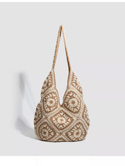 Front view of the crochet granny-square shoulder bag