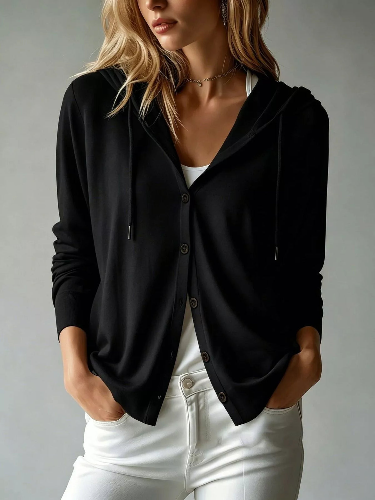 Black hooded button-down cardigan with drawstrings, modeled front view