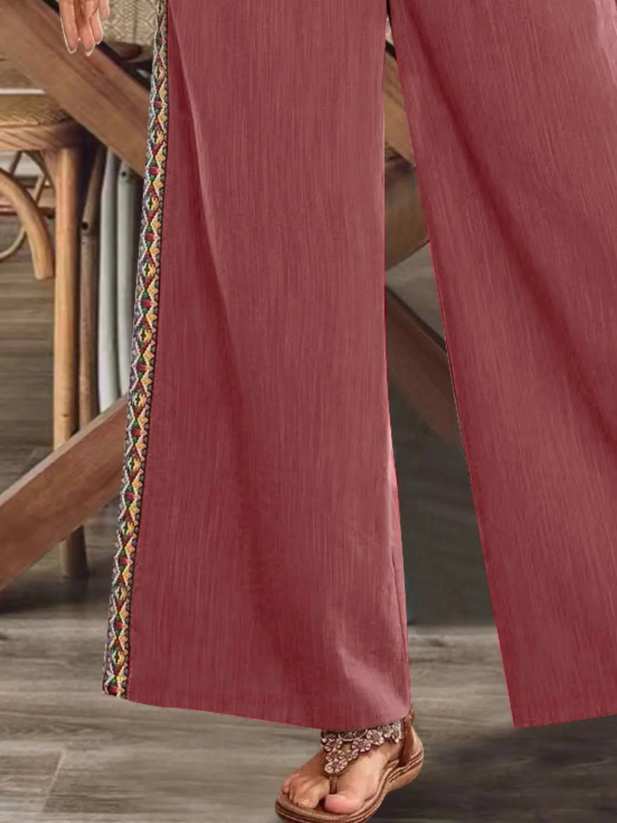 Close view of dusty rose side stripe and hem