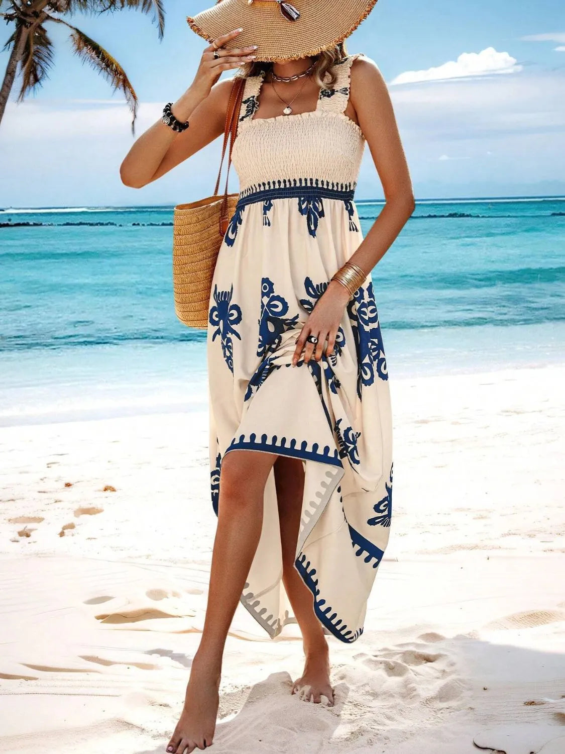 Full-length view of blue and cream printed maxi dress