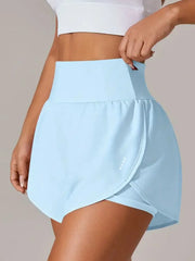 Front view of powder-blue shorts with wide waistband and curved outer layer