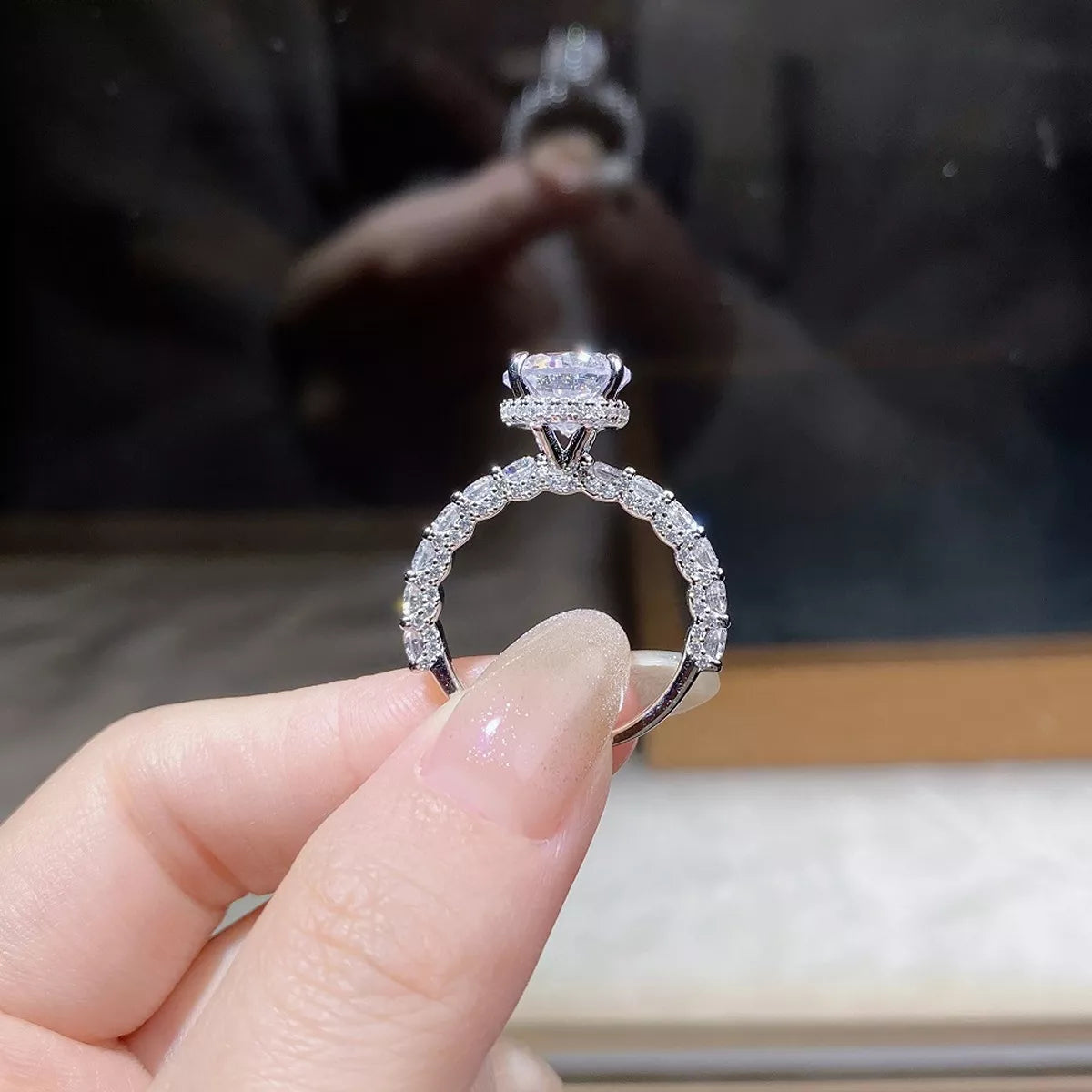 Back view through the ring band showing the elevated center setting.