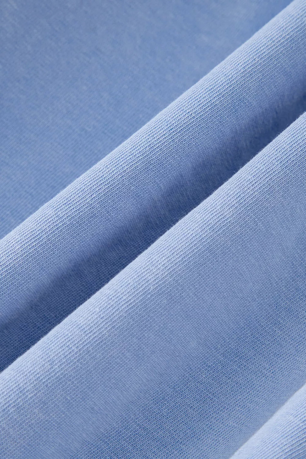Close-up of soft blue shorts fabric