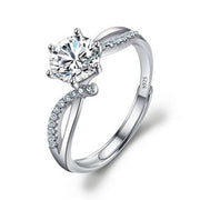 925 sterling silver moissanite ring with pavé details on white background