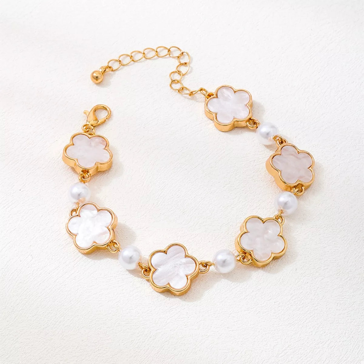 18k gold-plated alloy flower bracelet, close-up view