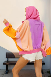 Dusty rose zip-up hoodie with drawstring hood, front pockets, and exposed seams.