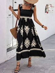 Black floral-print maxi dress with wide straps and smocked bodice