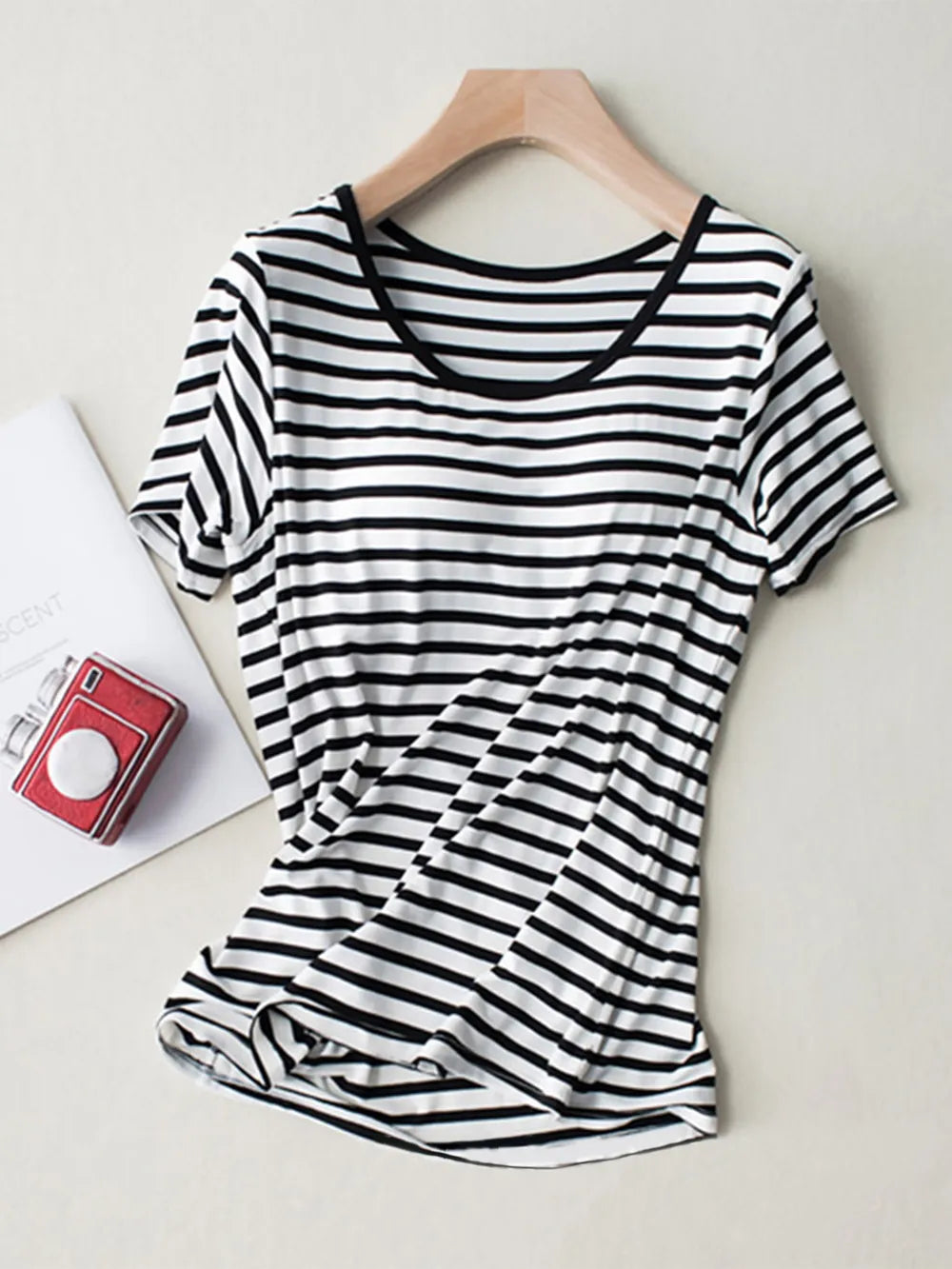 Black-and-white striped short-sleeve shirt on hanger