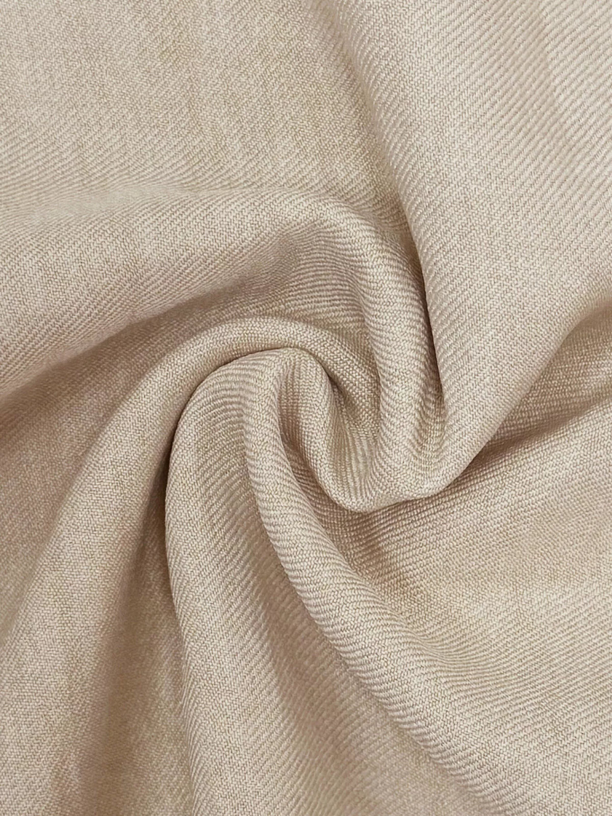 Close-up of beige fabric texture