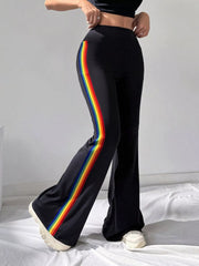 Black pants with rainbow side stripe and flared hem