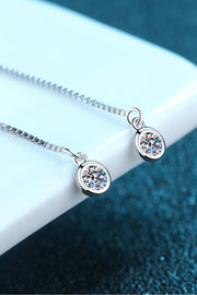 Moissanite 925 Sterling Silver Threader Earrings — Threader earrings with moissanite ends on a white display