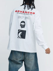 Model wearing a white long-sleeve graphic shirt with black chest lettering