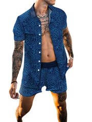 Blue patterned shirt and shorts set shown on a model against a plain white background.