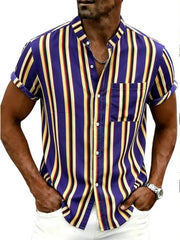 Model wearing a navy shirt with bold yellow and white vertical stripes
