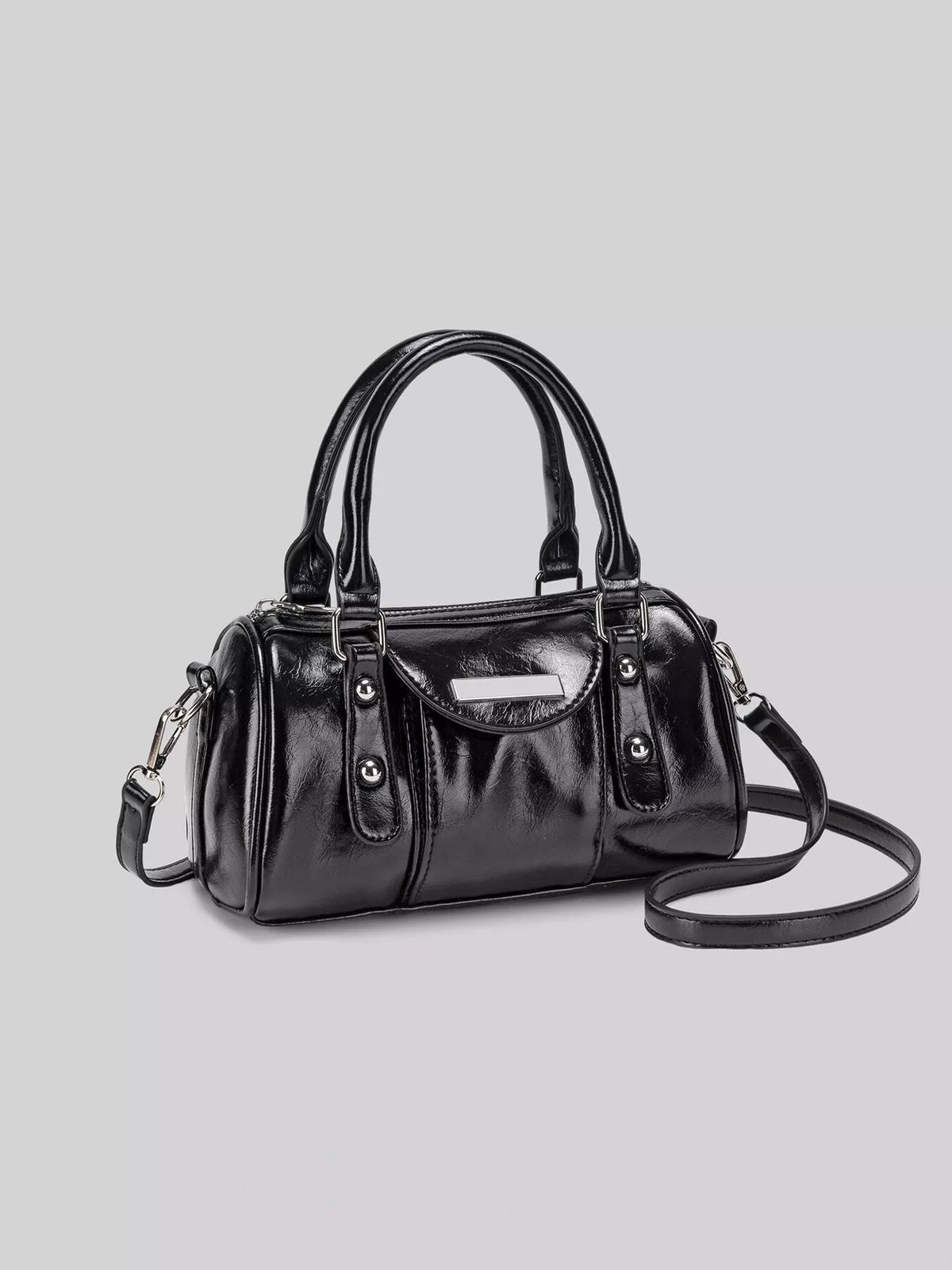 Front three-quarter view of the glossy black Boston bag with the detachable strap extended.