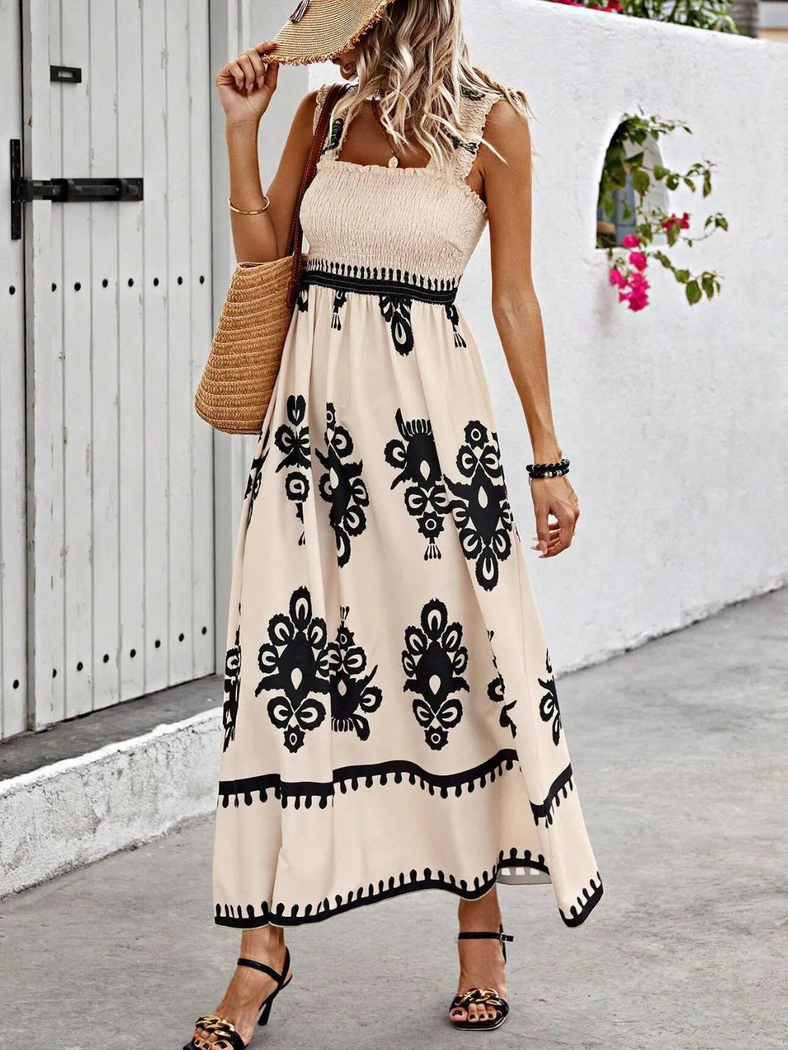 Cream maxi dress with black floral print, front view