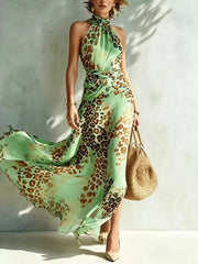 Mint green leopard-print halter maxi dress with flowing slit skirt
