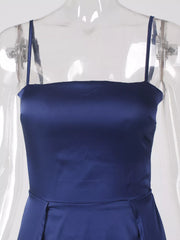 Front close-up of the straight neckline and fitted bodice of the blue strappy dress