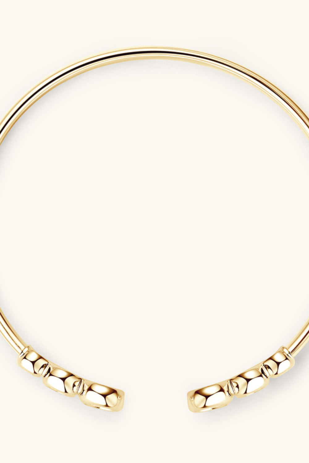 Close-up of the moissanite bracelet setting and polished metal band